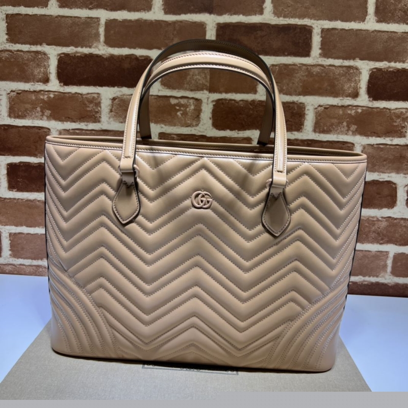 G*u*i shopping bags